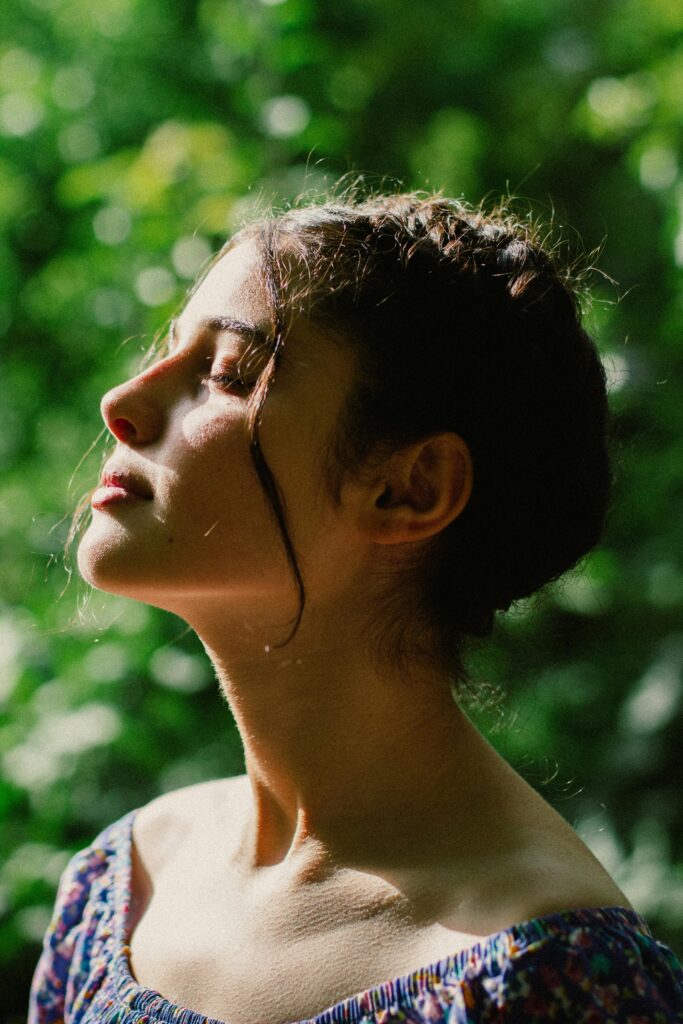 profile of a woman enjoying sunlight